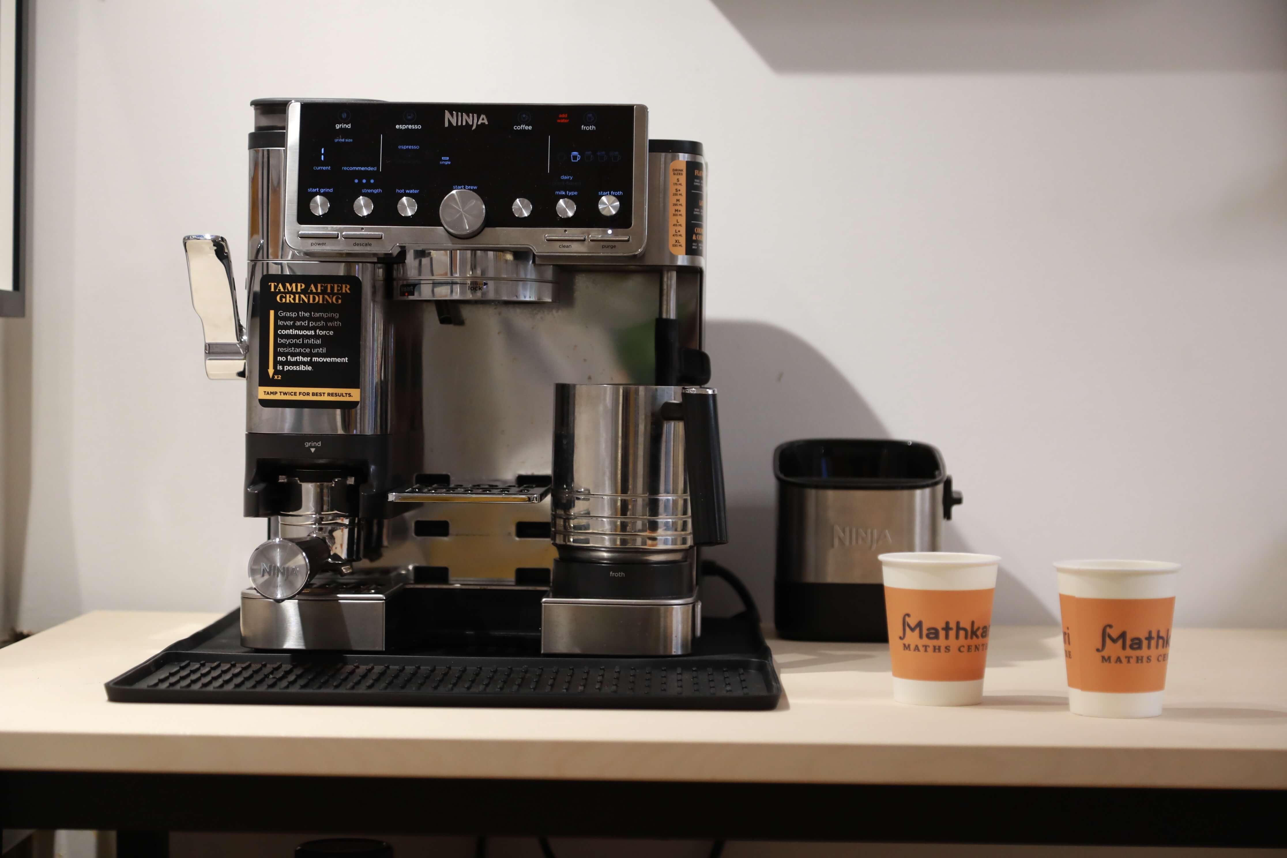 Coffee machine at the centre