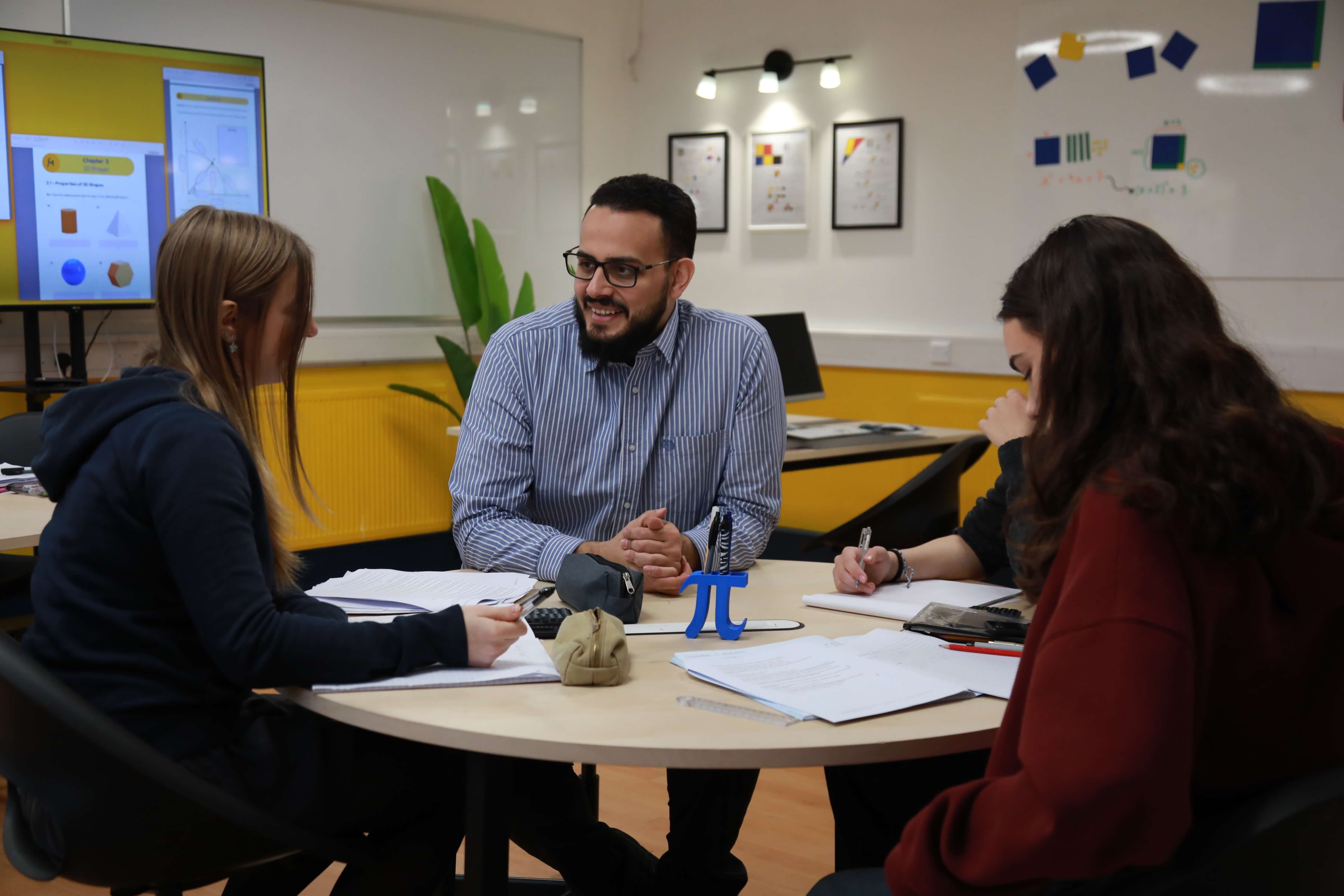 Mohammed teaching pupils at Mathkari